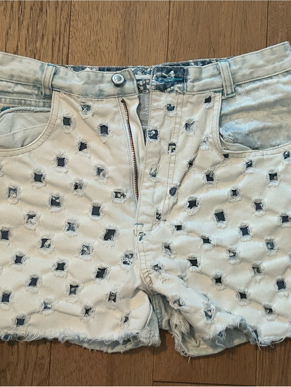 Vintage women’s Light Blue Distressed Jean Shorts with Cutout Detail